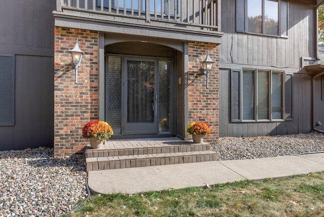 doorway to property featuring a balcony