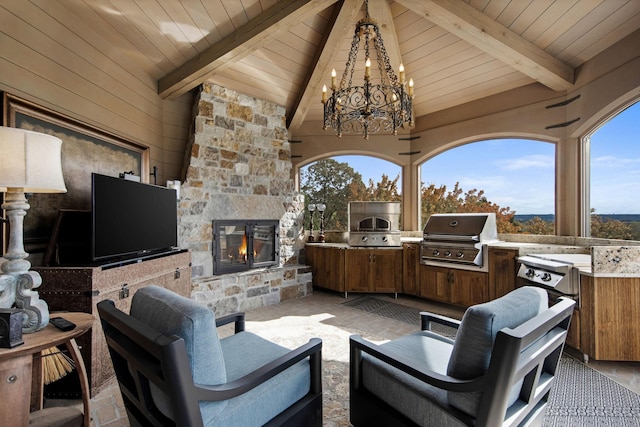 10675 Cavallo Rdg, Eden Prairie, MN 55347 - view of patio with an outdoor stone fireplace, an outdoor kitchen, and a gazebo