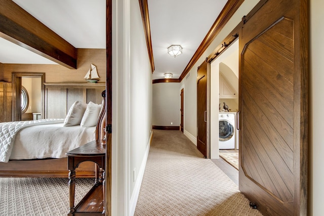 10675 Cavallo Rdg, Eden Prairie, MN 55347 - carpeted bedroom with washer / dryer, a barn door, and ornamental molding