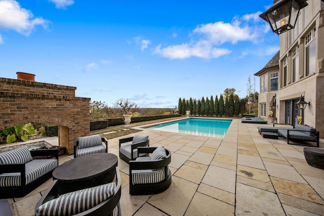 10675 Cavallo Rdg, Eden Prairie, MN 55347 - swimming pool with a patio and an outdoor living space