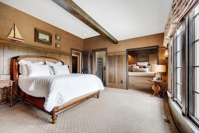 10675 Cavallo Rdg, Eden Prairie, MN 55347 - carpeted bedroom featuring multiple windows, beamed ceiling, and wood walls