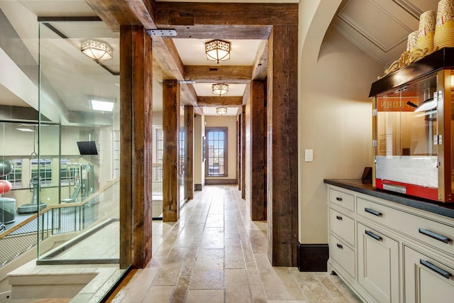 10675 Cavallo Rdg, Eden Prairie, MN 55347 - corridor with stone tile flooring and beam ceiling