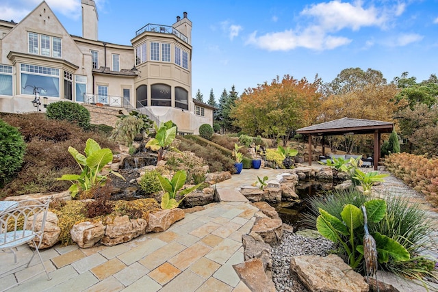 10675 Cavallo Rdg, Eden Prairie, MN 55347 - view of patio / terrace with a gazebo