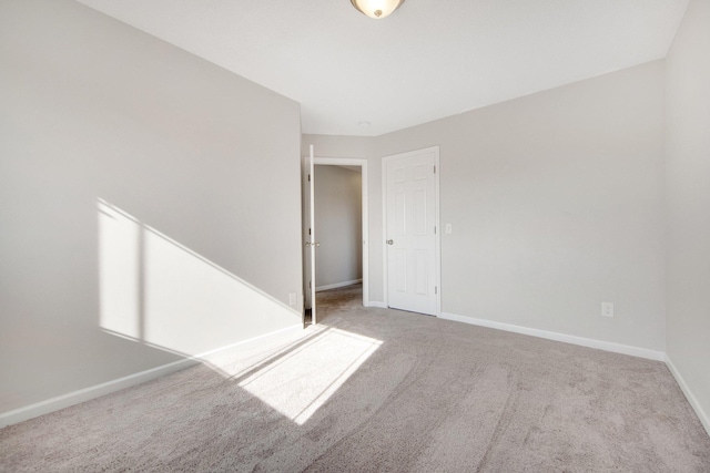 spare room with carpet flooring