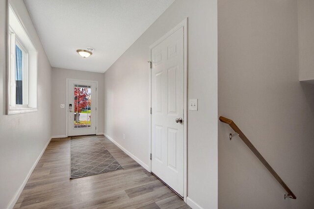 doorway featuring light hardwood / wood-style floors