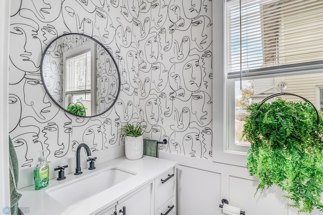 bathroom featuring vanity and a wealth of natural light