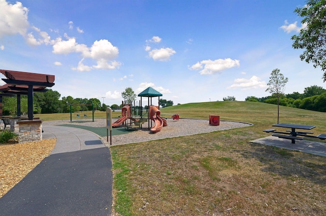 view of play area featuring a lawn