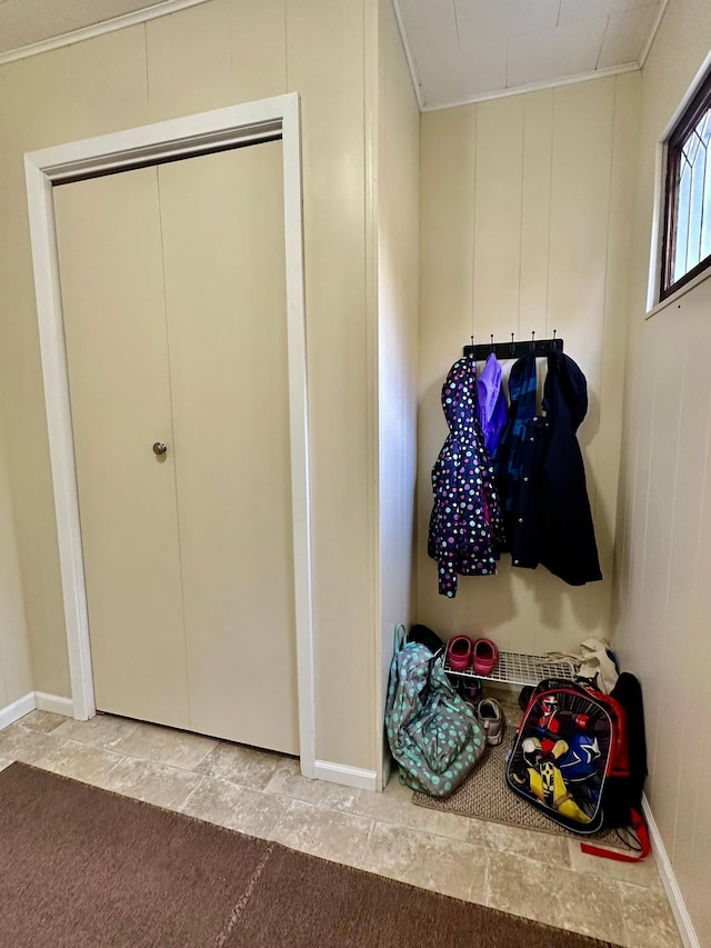 interior space featuring wood walls