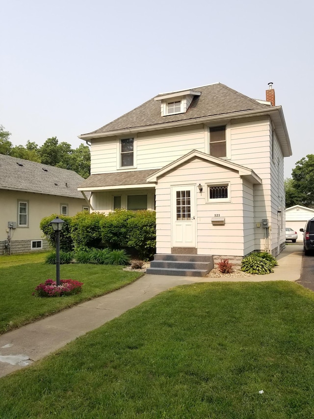 view of front property featuring a front lawn