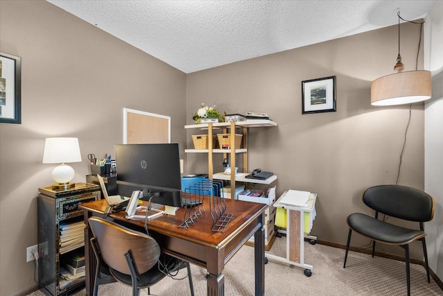 office space with a textured ceiling, carpet flooring, and vaulted ceiling