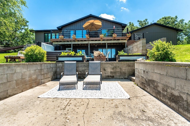 29777 Highland Loop, Battle Lake, MN 56515 - rear view of property featuring a patio area and a balcony