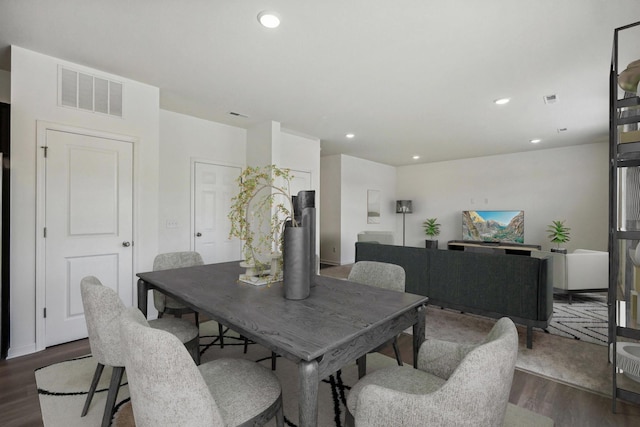 dining room featuring dark wood-type flooring