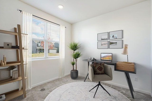 view of carpeted office space