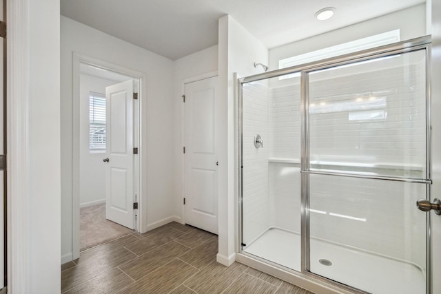 bathroom featuring an enclosed shower