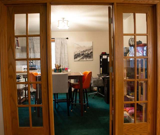 view of carpeted dining space