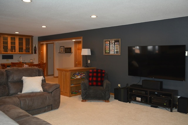 carpeted living room featuring recessed lighting