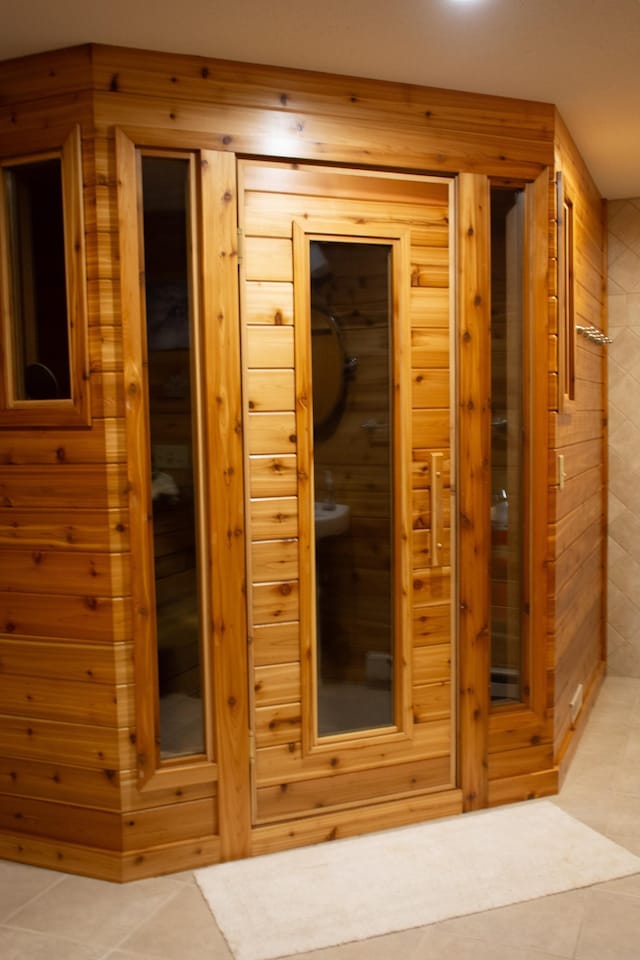 view of sauna / steam room with tile patterned floors