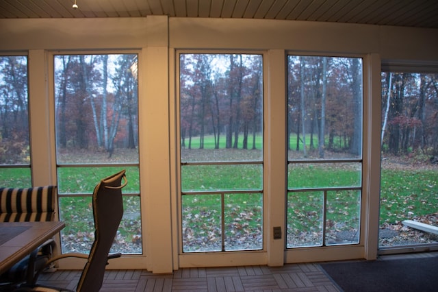 sunroom with wood ceiling