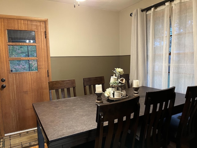 dining space featuring hardwood / wood-style floors