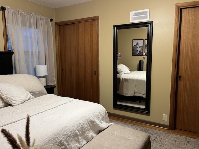 bedroom featuring a closet and hardwood / wood-style flooring