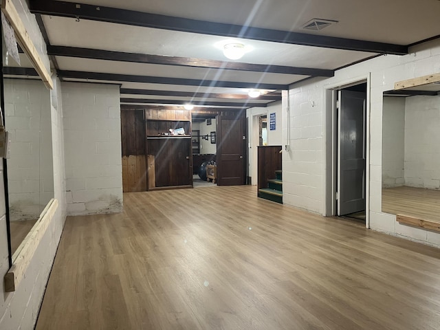 basement featuring hardwood / wood-style flooring