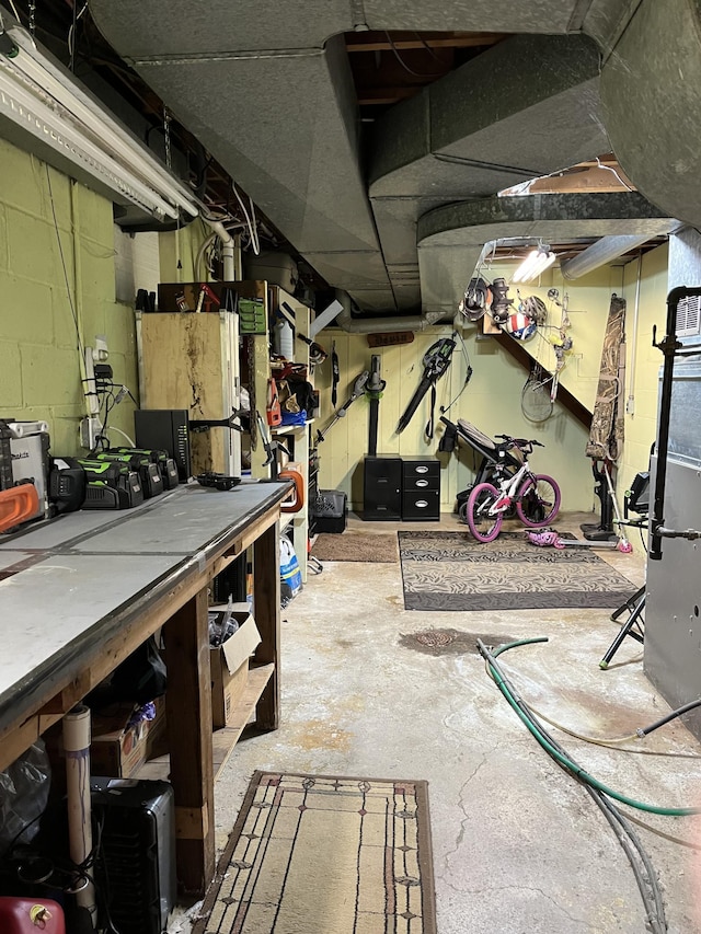 basement with a workshop area