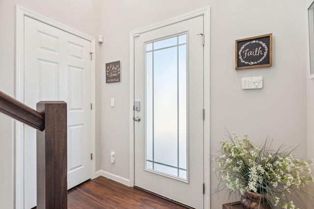 foyer with dark wood-type flooring