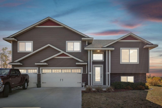 view of front of property with a garage