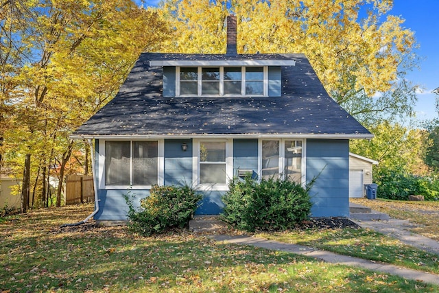 exterior space with a front lawn