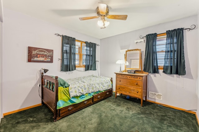 carpeted bedroom with ceiling fan