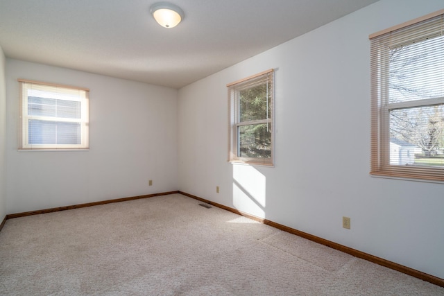 view of carpeted spare room