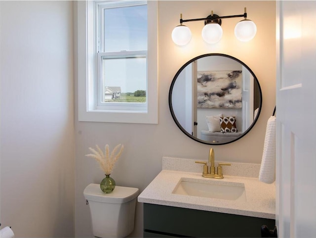 half bath with toilet and vanity