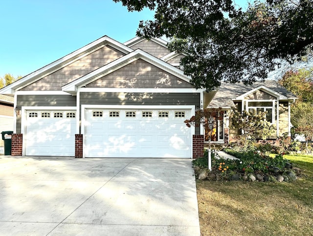 craftsman inspired home with a garage