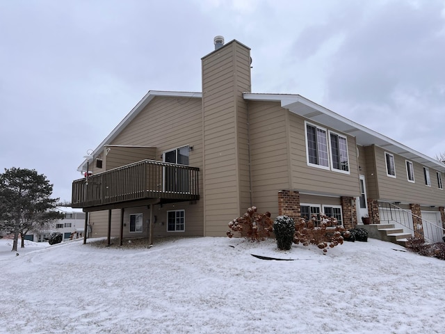 view of snow covered property