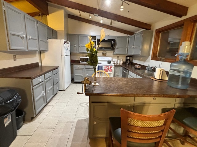 kitchen with white appliances, vaulted ceiling with beams, gray cabinets, light tile patterned floors, and kitchen peninsula