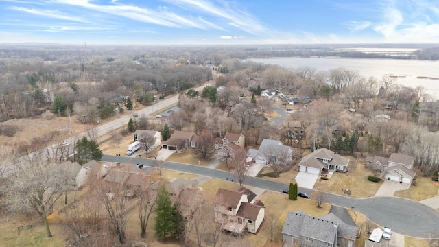 birds eye view of property with a residential view