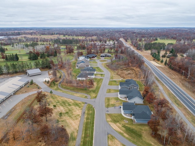 aerial view of property's location featuring nearby suburban area