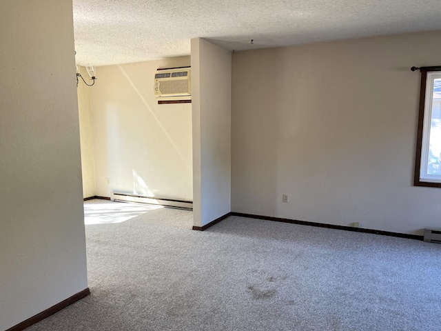 carpeted empty room featuring an AC wall unit, a textured ceiling, and a baseboard radiator