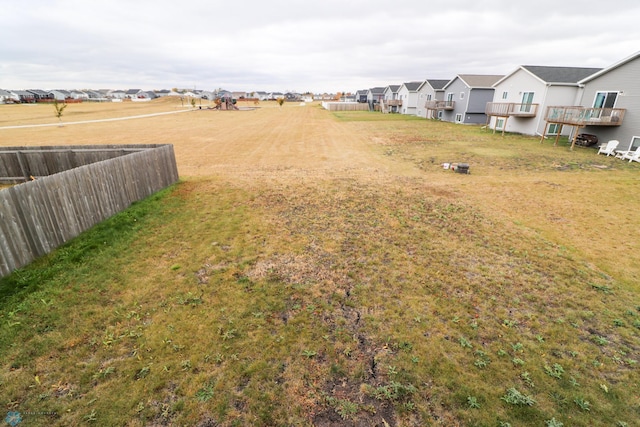 view of yard with a wooden deck