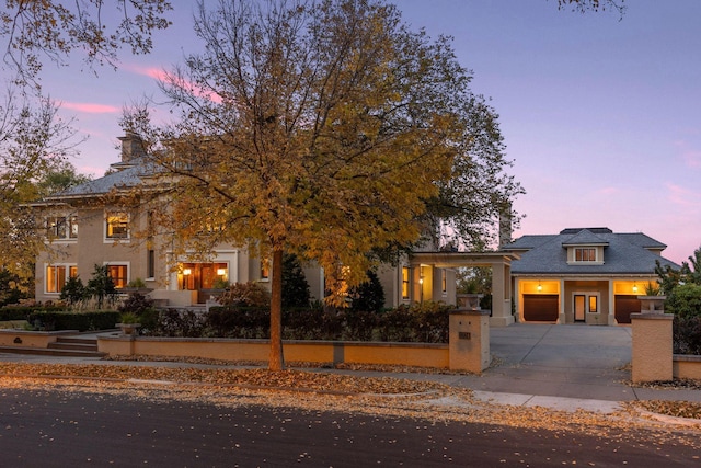 view of front of property with a garage