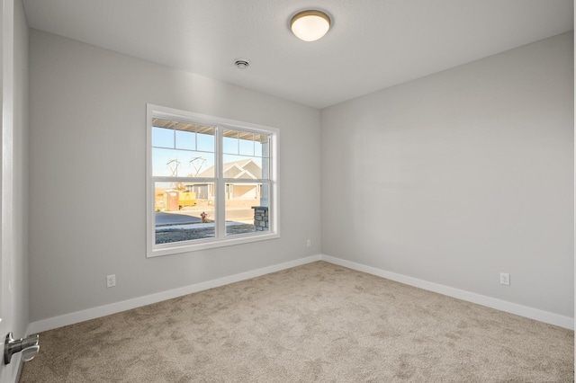 empty room with carpet floors