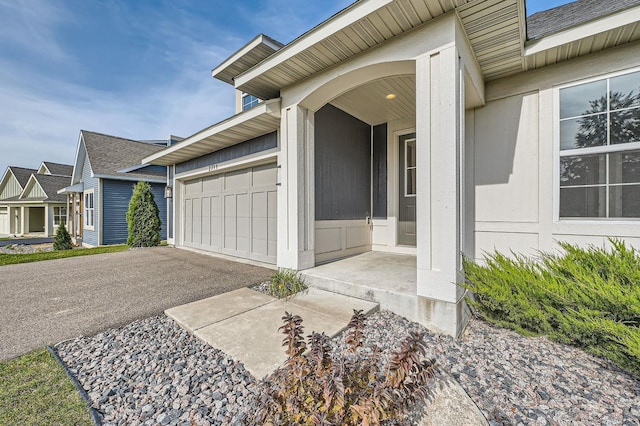 2711 Buffalo Ridge Dr, Buffalo, MN 55313 - view of exterior entry featuring driveway and a garage