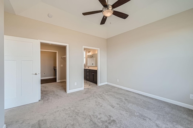 2711 Buffalo Ridge Dr, Buffalo, MN 55313 - unfurnished bedroom featuring a closet, baseboards, connected bathroom, a spacious closet, and light carpet