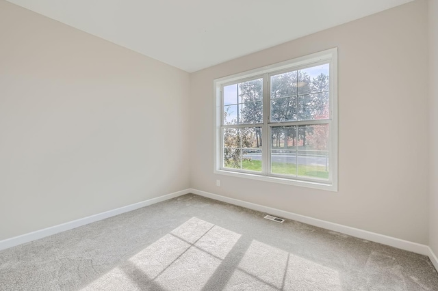 2711 Buffalo Ridge Dr, Buffalo, MN 55313 - empty room with baseboards, light carpet, and visible vents