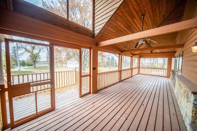 wooden terrace featuring ceiling fan