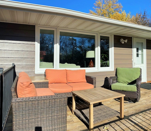 wooden deck featuring an outdoor living space