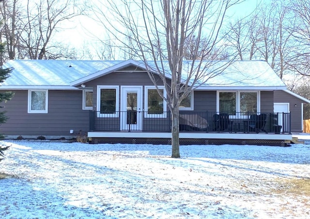 view of snow covered house