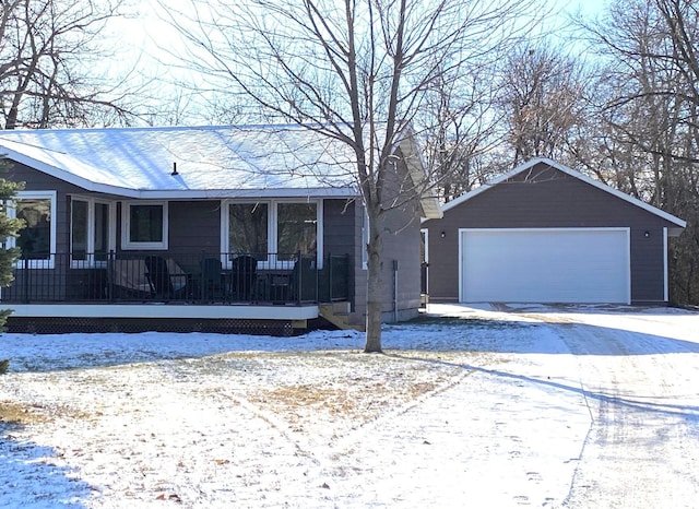 view of front facade featuring covered porch and a garage