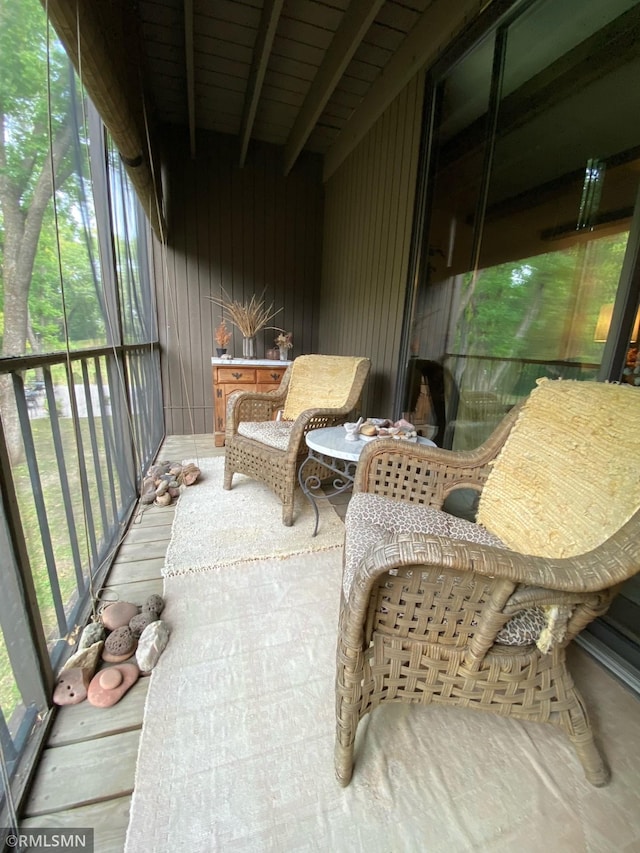 sunroom / solarium with beam ceiling