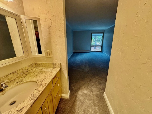 bathroom featuring vanity and ornamental molding